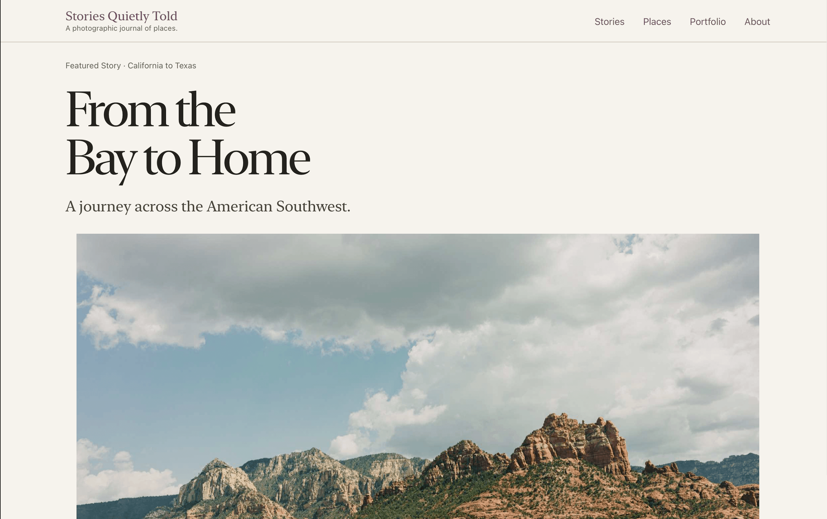Stories Quietly Told desktop homepage featuring the story From the Bay to Home and a photograph of the American Southwest.